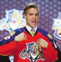 Aaron Ekblad reacts to putting on the Florida Panthers sweater for the first time at the 2014 NHL Entry Draft.